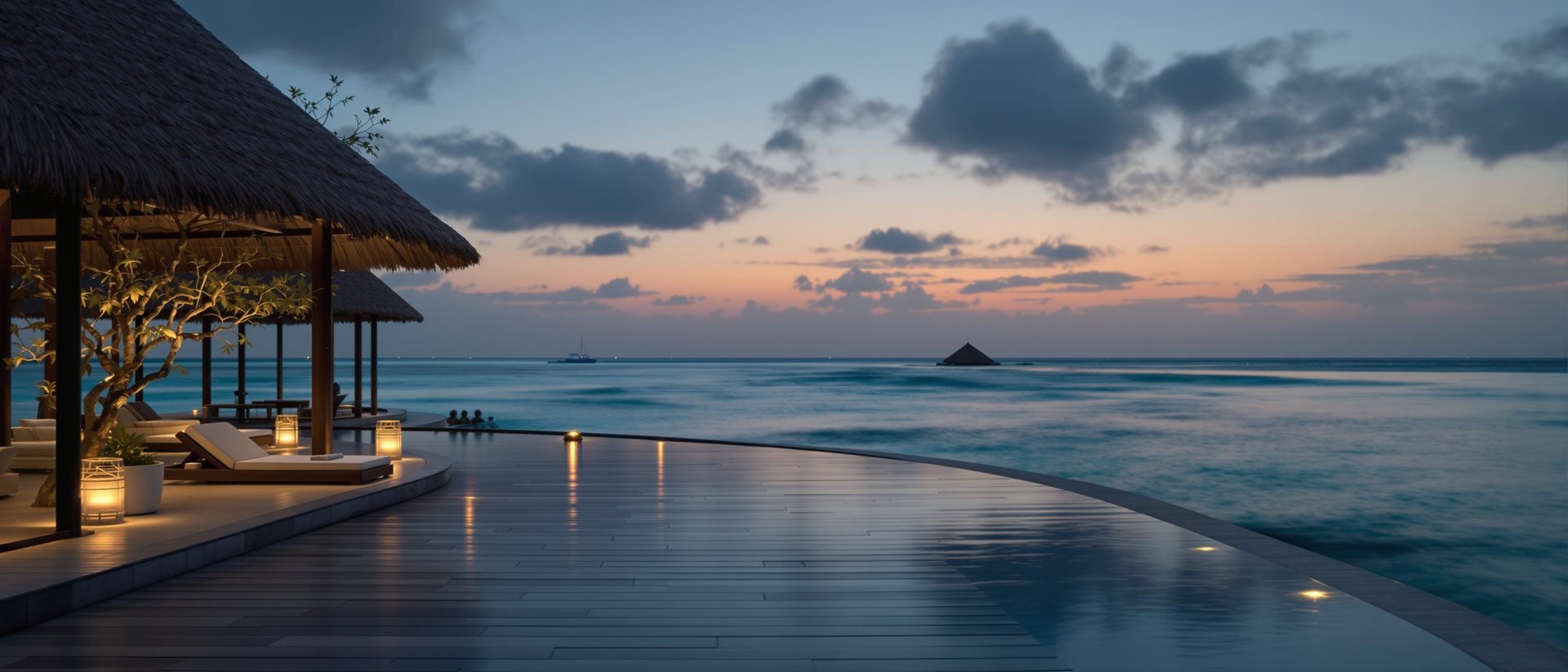 Resort infinity pool and open pavilion at dusk
